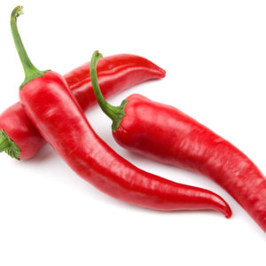 three red hot chili pepper isolated on a white background